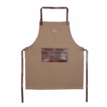 Șorț BBQ pentru bucătărie sau grătar din material manufacturat de o afacare de familie, din denim și piele ecologică, maro.